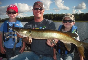 Client Kurt and his 4 and 8 year old sons with a musky from an August outing. Hooked/missed 2 more fish and raised a few more. Future musky slayers for sure!