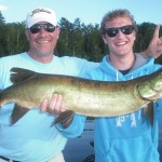 Father son clients Mark and Kale from Kansas and fish 2 of 3 on a triple on the first day of their 1.5 day fishing trip. Kale's third musky ever!