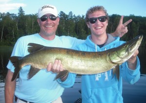 Father son clients Mark and Kale from Kansas and fish 2 of 3 on a triple on the first day of their 1.5 day fishing trip. Kale's third musky ever!