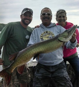 (Fish 2 of 2) A beautiful 44" musky for Bill with his son and daughter on a full day trip. July 2014.