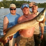 Tim with his new personal best musky (48.5")!