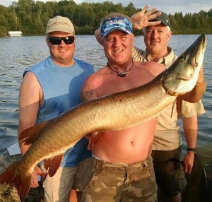 Tim with his new personal best musky (48.5")!